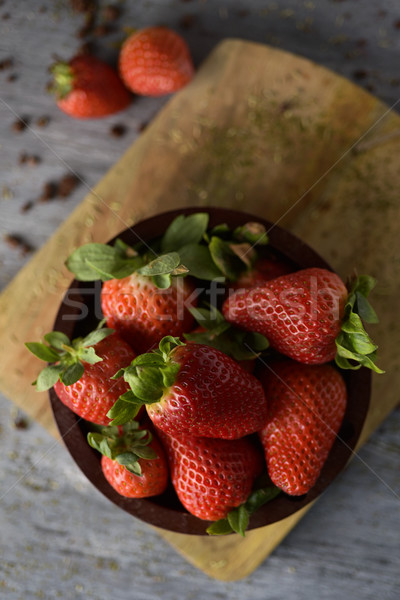 ripe strawberries in a wooden bowl Stock photo © nito