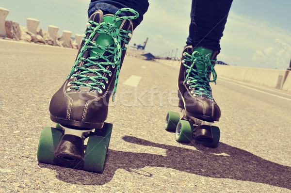 closeup of a young man roller skating, with a cross-processed ef Stock photo © nito