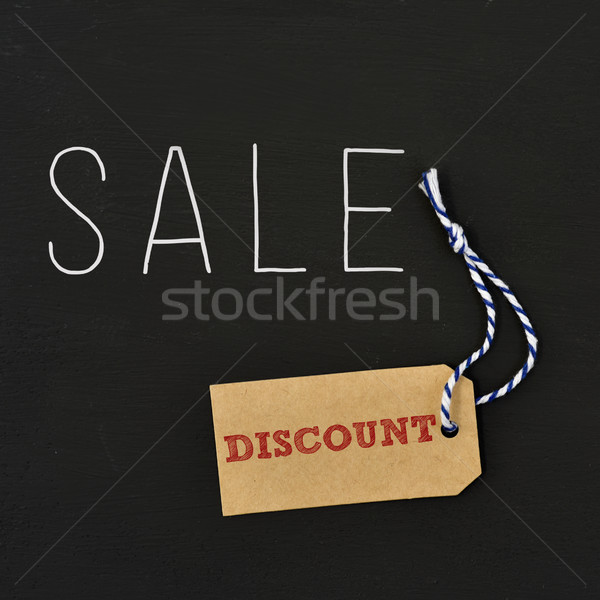 word sale and paper label with the word discount Stock photo © nito