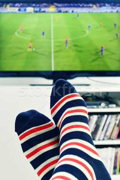 man watching a soccer match in the TV Stock photo © nito