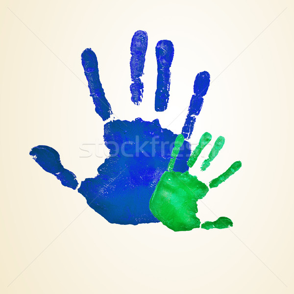 adult and infant handprints Stock photo © nito