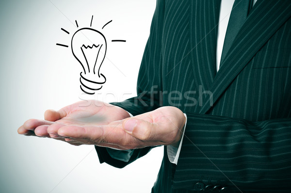 Férfi villanykörte visel öltöny rajzolt kéz Stock fotó © nito