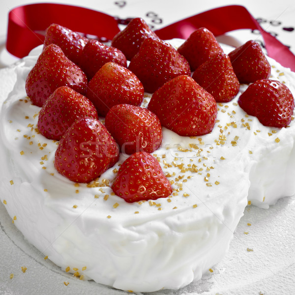 cake covered with cream and topped with strawberries Stock photo © nito