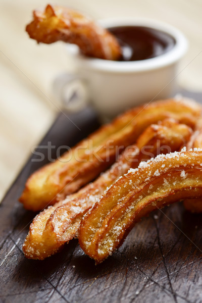 churros con chocolate, a typical Spanish sweet snack Stock photo © nito