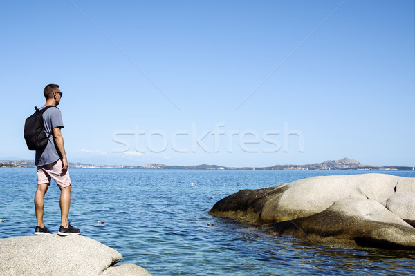 young man observing the sea in Sardinia, Italy Stock photo © nito