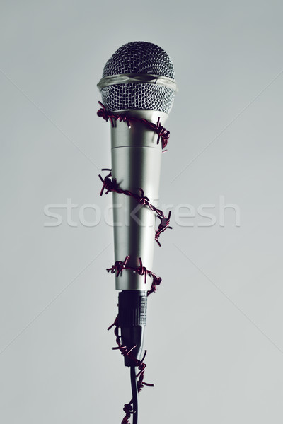 barbed wire around a microphone Stock photo © nito