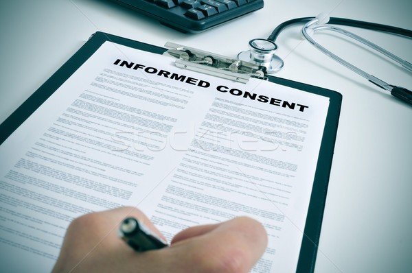 signing an informed consent Stock photo © nito