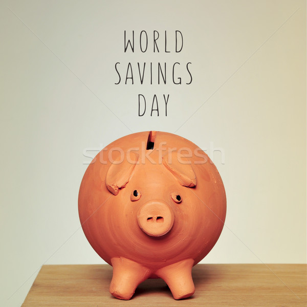 piggy bank and text world savings day Stock photo © nito