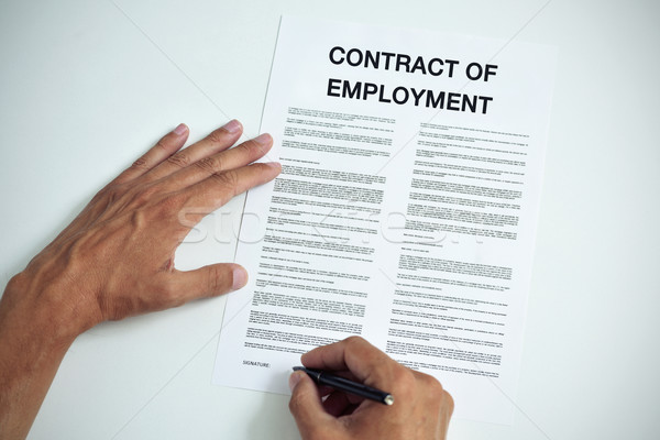 man signing a contract of employment Stock photo © nito