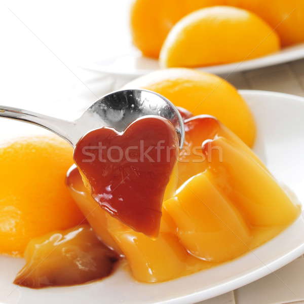 creme caramel and peach in syrup Stock photo © nito