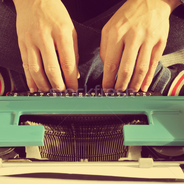 young man typewriting, with a retro effect Stock photo © nito