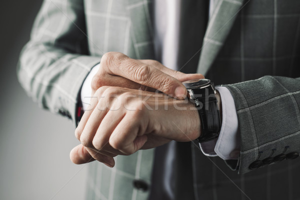 businessman adjusting his wristwatch Stock photo © nito