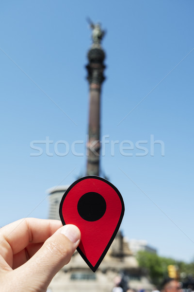 Stock photo: man with a red marker in the Columbus Monument