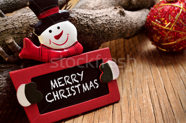 Joyeux Noël écrit tableau forme bonhomme de neige [[stock_photo]] © nito