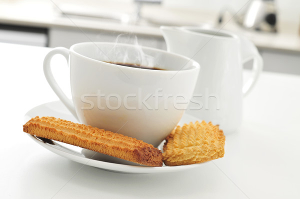 coffee and biscuits on the kitchen table Stock photo © nito