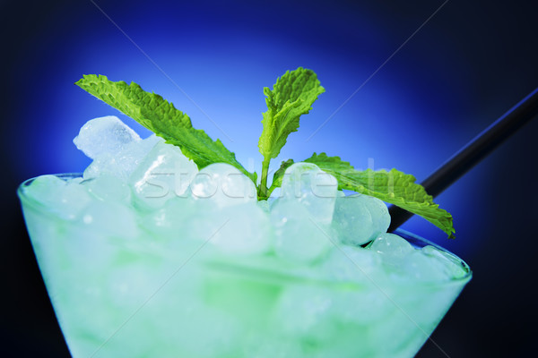 refreshing cocktail over a blue lighted background Stock photo © nito