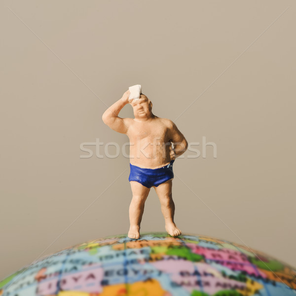 Miniatűr férfi fürdőruha visel homlok zsebkendő Stock fotó © nito