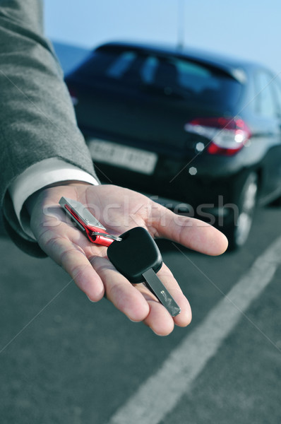 man offering a car key to the observer Stock photo © nito