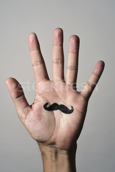 Moustache Palm jeune homme main Photo stock © nito