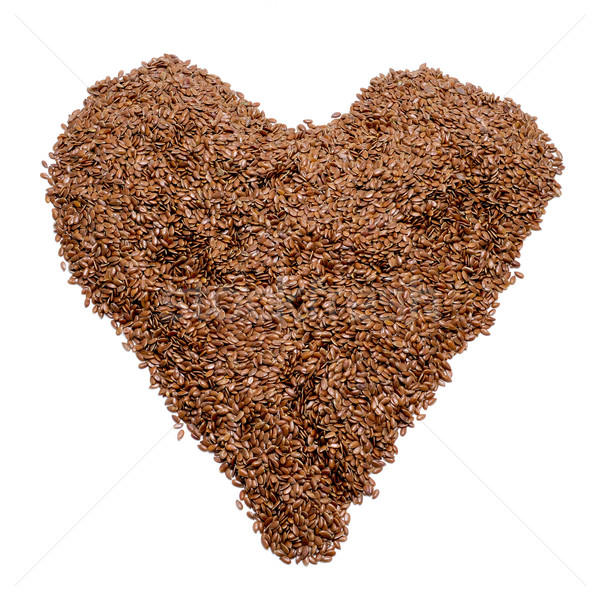 brown flax seeds forming a heart Stock photo © nito