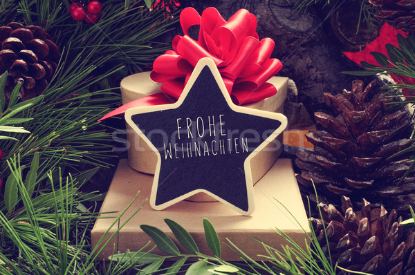 star-shaped chalkboard with the text Frohe Weihnachten, Merry Ch Stock photo © nito