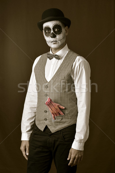 man with mexican calaveras makeup and amputated hand Stock photo © nito