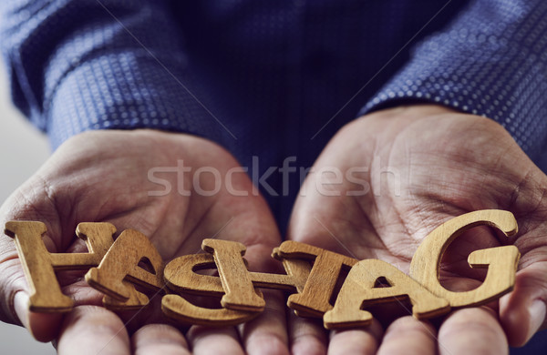 word hashtag in the hands of a man Stock photo © nito