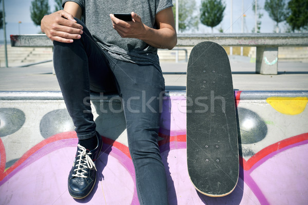 skater man using his smartphone Stock photo © nito
