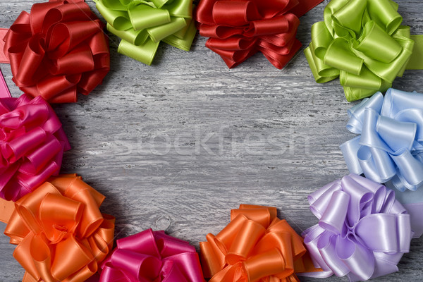 gift ribbon bows forming a circular frame Stock photo © nito