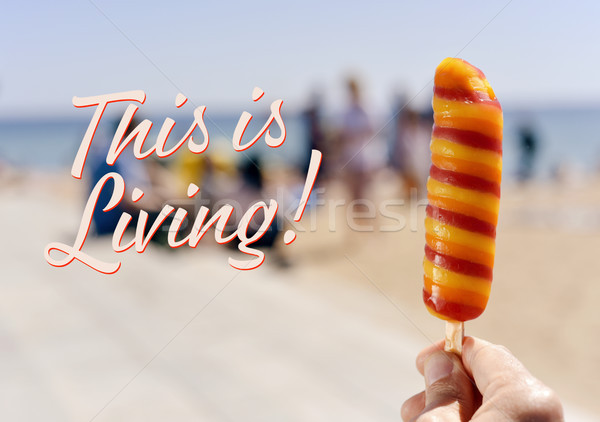 popsicle on the beach and text this is living Stock photo © nito