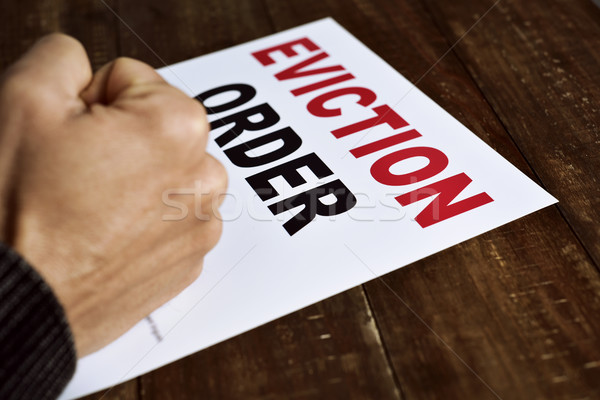 man who has received an eviction order Stock photo © nito