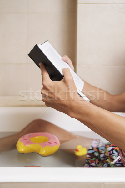 man in swimsuit reading a book in the bathtub Stock photo © nito