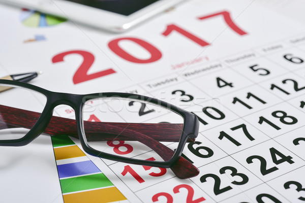 eyeglasses, charts and 2017 calendar Stock photo © nito
