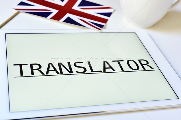 flag of the United Kingdom and the word translator in a tablet Stock photo © nito