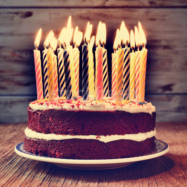 birthday cake with some lit candles, filtered Stock photo © nito