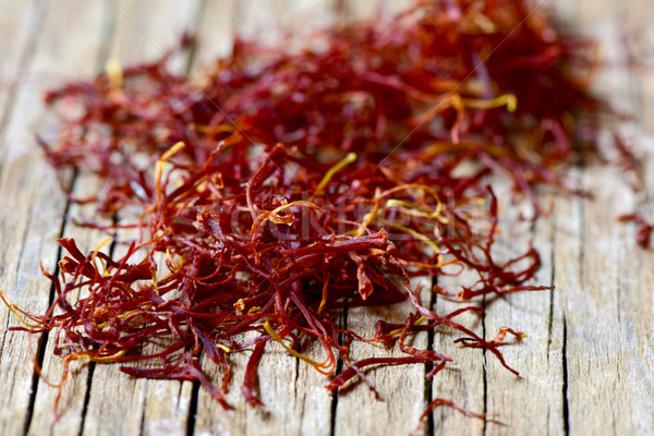 saffron threads on a rustic wooden table Stock photo © nito