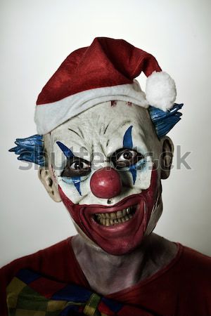 evil clown using a smartphone Stock photo © nito