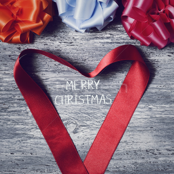 Stock photo: gift ribbon bows and text merry christmas