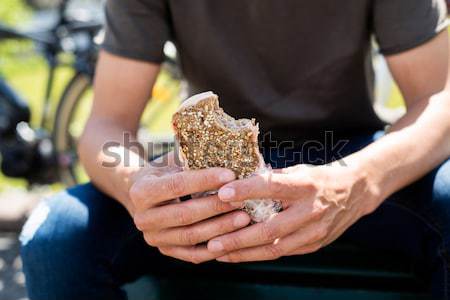 man eating a spanish omelette sandwich Stock photo © nito