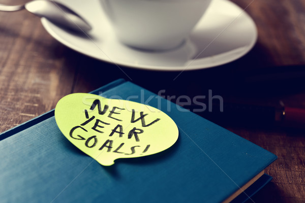 text new years goals in a notepad Stock photo © nito