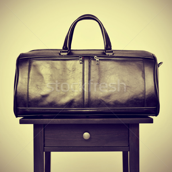 leather bag on a table, with a retro effect Stock photo © nito