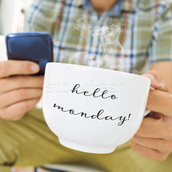 young man with a cup with the text hello monday Stock photo © nito