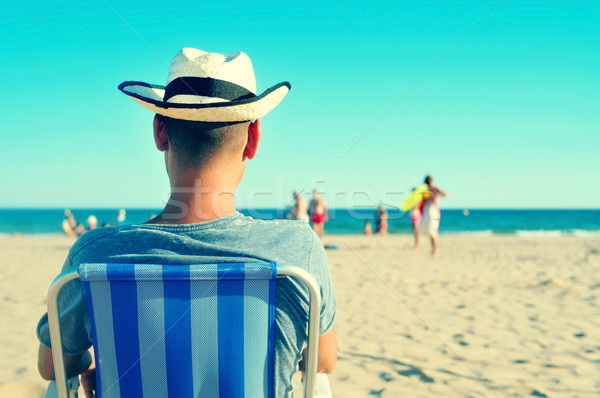Joven relajante playa sombrero de paja mar verano Foto stock © nito