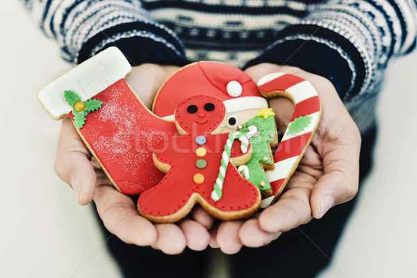 man with christmas cookies in his hands Stock photo © nito