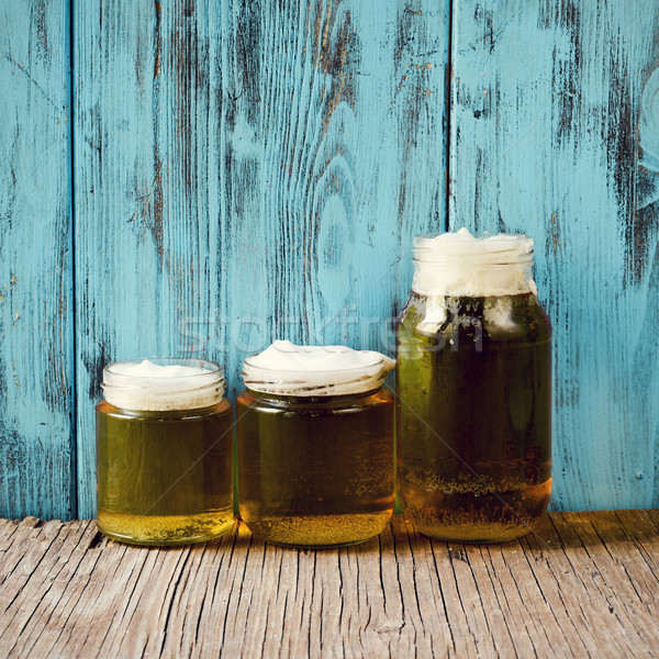 Stock photo: beer served in glass jars