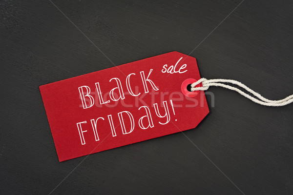 Stock photo: text black friday sale in a red paper label