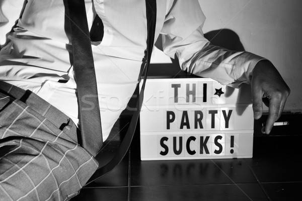 Stock photo: text this party sucks in a lightbox