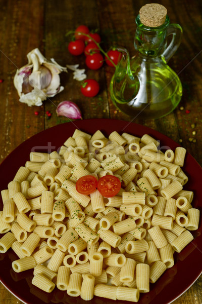 cooked penne rigate, tomato, garlic and olive oil Stock photo © nito