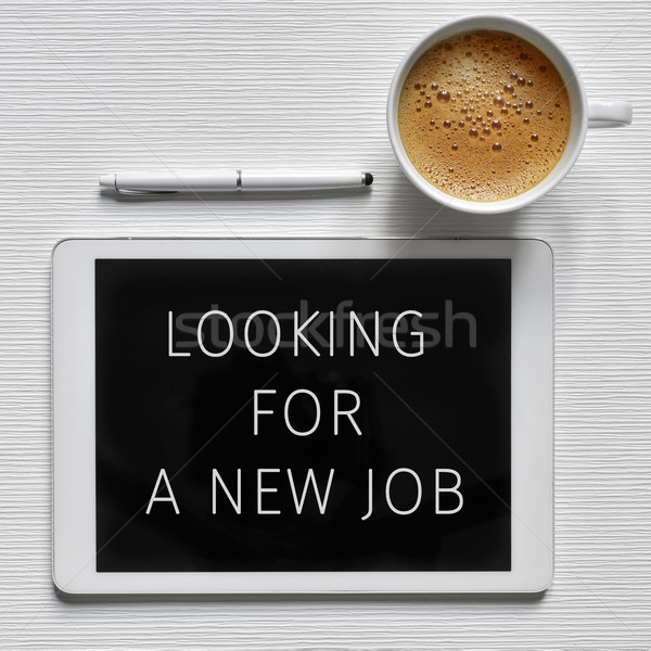text looking for a new job in a tablet Stock photo © nito