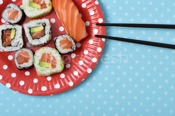 sushi in a red plate patterned with white dots Stock photo © nito